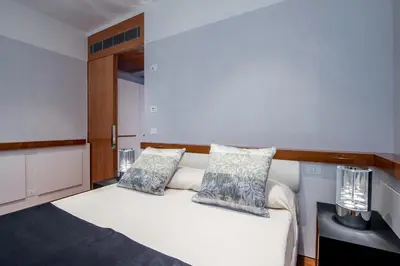 Letto o letti in una camera di Hotel Rialto