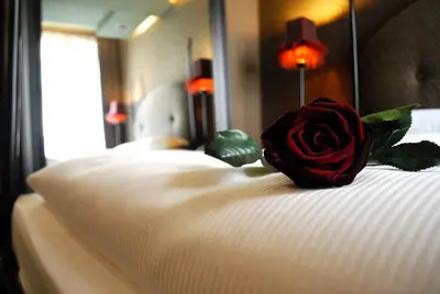 Letto o letti in una camera di Hotel Palazzo Barbarigo Sul Canal Grande