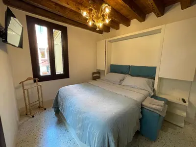 Letto o letti in una camera di Remer Suites