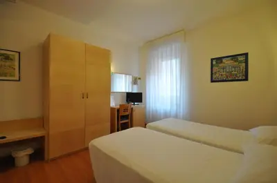 Letto o letti in una camera di Hotel Igea