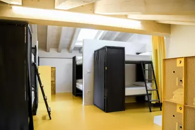 Letto o letti in una camera di Nomad Hostel