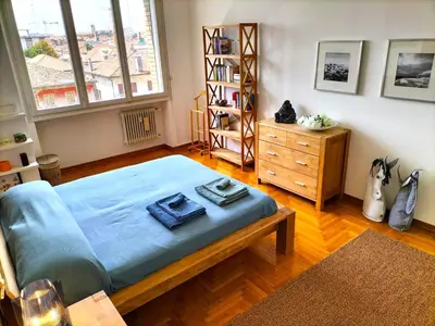 Letto o letti in una camera di DARIO.HOME Amabile dimora in centro a Treviso