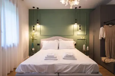 Letto o letti in una camera di AL TIGLIO