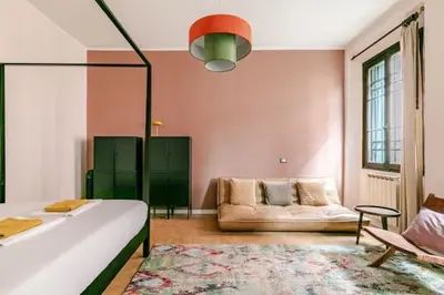 Letto o letti in una camera di Venetian pink apartment in Dorsoduro