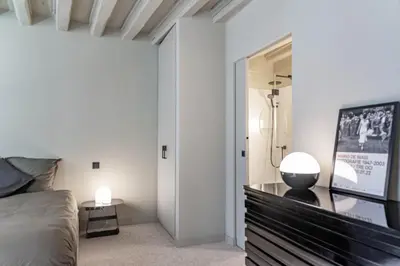 Letto o letti in una camera di Ca' Delle Carrozze Stylish 2 Bedroom loft-style