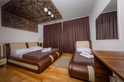 Letto o letti in una camera di Hotel Trieste