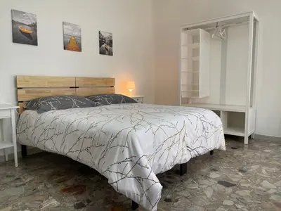 Letto o letti in una camera di OTB Italia 3 - Ampio appartamento tra Venezia e Treviso con 3 camere e terrazze panoramiche