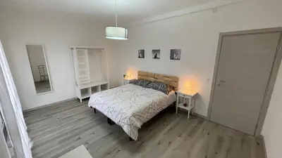 Letto o letti in una camera di OTB Italia 3 - Ampio appartamento tra Venezia e Treviso con 3 camere e terrazze panoramiche