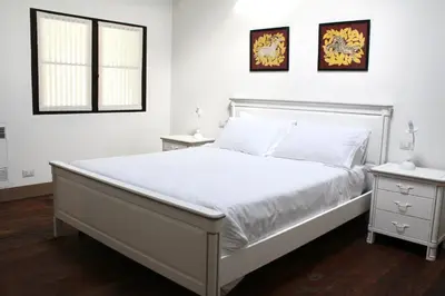 Letto o letti in una camera di Villa Trieste M