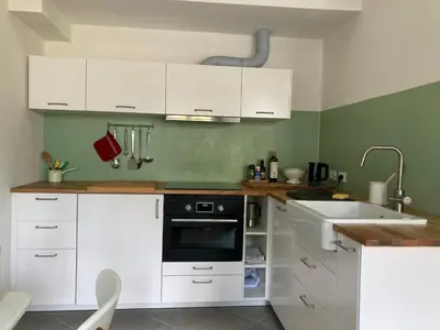 Cucina o angolo cottura di mini loft Lido with own sunny & private garden