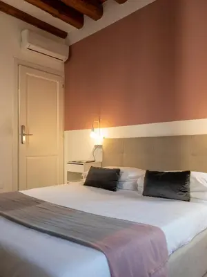 Letto o letti in una camera di Foscà Venice Rooms
