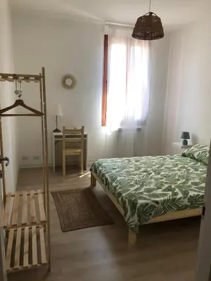 Letto o letti in una camera di Casa Mestrina