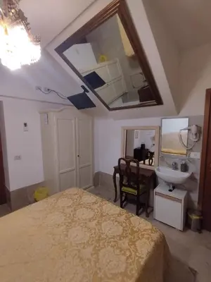 Letto o letti in una camera di Alloggi Acquavita - checkin at 
