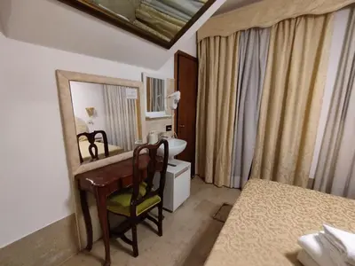 Letto o letti in una camera di Alloggi Acquavita - checkin at 