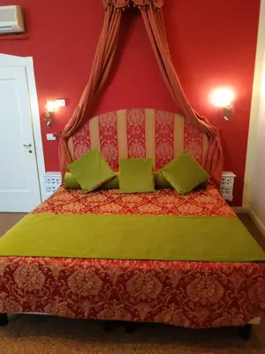 Letto o letti in una camera di Alloggi Acquavita - checkin at 