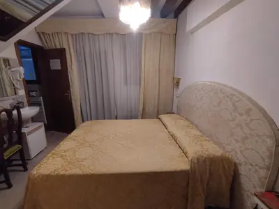 Letto o letti in una camera di Alloggi Acquavita - checkin at 