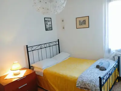 Letto o letti in una camera di Two Steps from Rialto