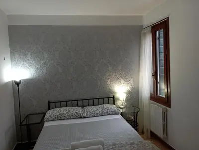 Letto o letti in una camera di Two Steps from Rialto