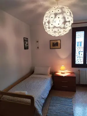 Letto o letti in una camera di Two Steps from Rialto