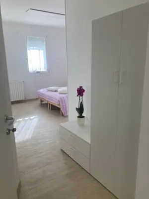 Letto o letti in una camera di ALLA CASA DEI NONNI