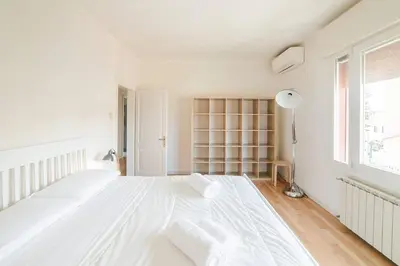 Letto o letti in una camera di Ca' Liberty