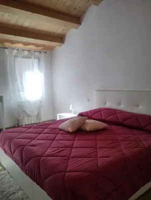 Letto o letti in una camera di La casa di Alice