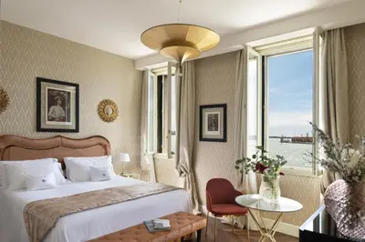 Letto o letti in una camera di Londra Palace Venezia