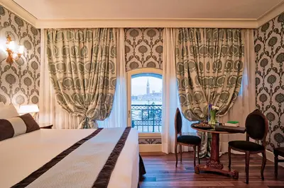 Letto o letti in una camera di Londra Palace Venezia