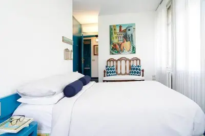 Letto o letti in una camera di Al Ponte Lungo - Giudecca