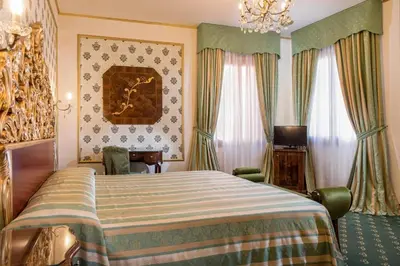 Letto o letti in una camera di Hotel Giorgione