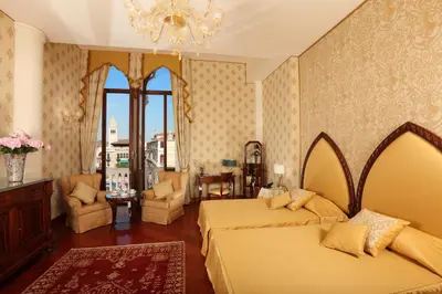 Letto o letti in una camera di Hotel Palazzo Stern