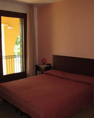 Letto o letti in una camera di Ca Florian