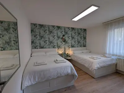 Letto o letti in una camera di Urban Oasis family apt 10 mins from Venice