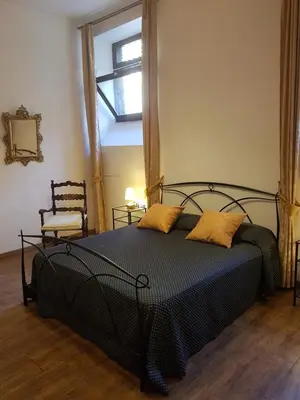 Letto o letti in una camera di Sarlette Cozy Room