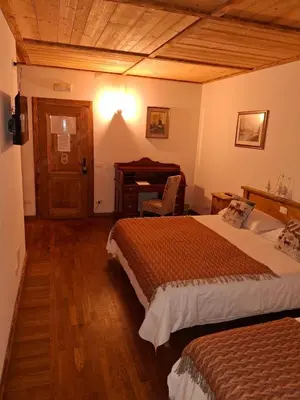 Letto o letti in una camera di Locanda Al Cacciatore