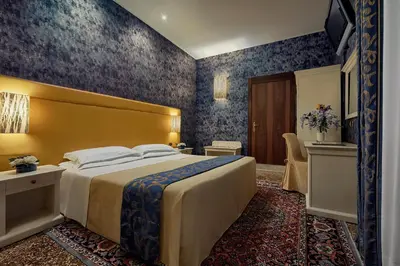 Letto o letti in una camera di Ca' Bragadin e Carabba
