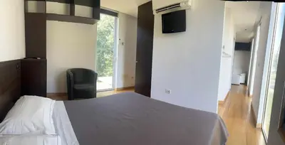 Letto o letti in una camera di Villa San Biagio