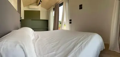 Letto o letti in una camera di Villa San Biagio