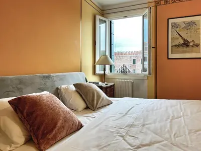 Letto o letti in una camera di Apartment with view in Venice, Arsenale.
