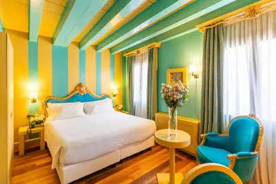 Letto o letti in una camera di Hotel Ca' Zusto Venezia