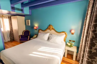 Letto o letti in una camera di Hotel Ca' Zusto Venezia