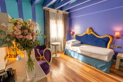 Letto o letti in una camera di Hotel Ca' Zusto Venezia