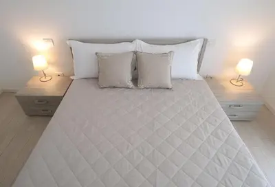 Letto o letti in una camera di Finisterrae 1 - Immobiliare Living