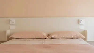 Letto o letti in una camera di Tempo B&B
