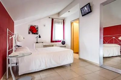 Letto o letti in una camera di Cà Dei Barcaroli
