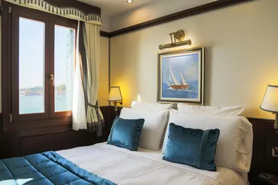 Letto o letti in una camera di Hotel Bucintoro