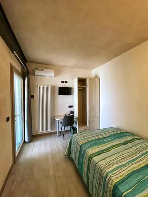 Letto o letti in una camera di Locazione Turistica El Sghirlo