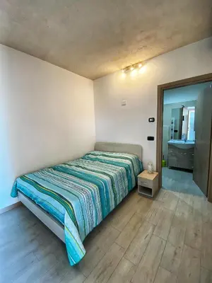 Letto o letti in una camera di Locazione Turistica El Sghirlo