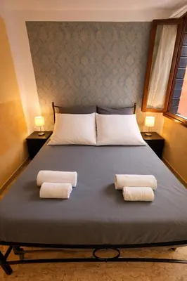Letto o letti in una camera di Two steps from Rialto bridge