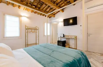 Letto o letti in una camera di B&B InCalle